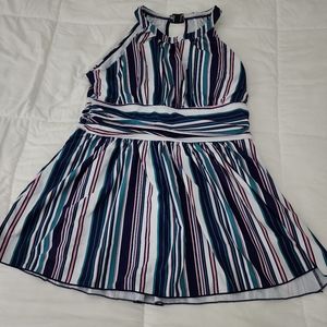 Large swimsuit never worn.